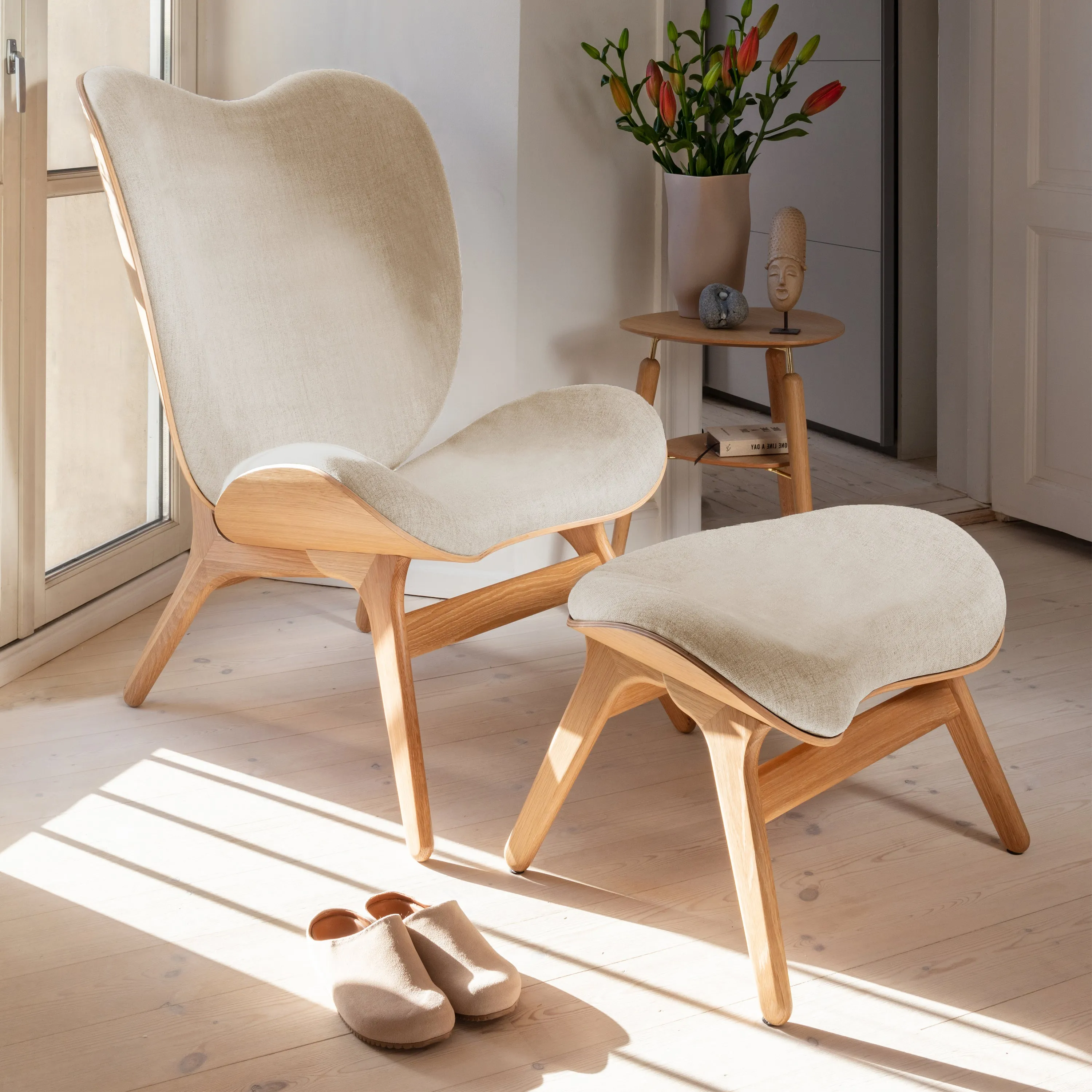 A Conversation Piece Tall Lounge Chair