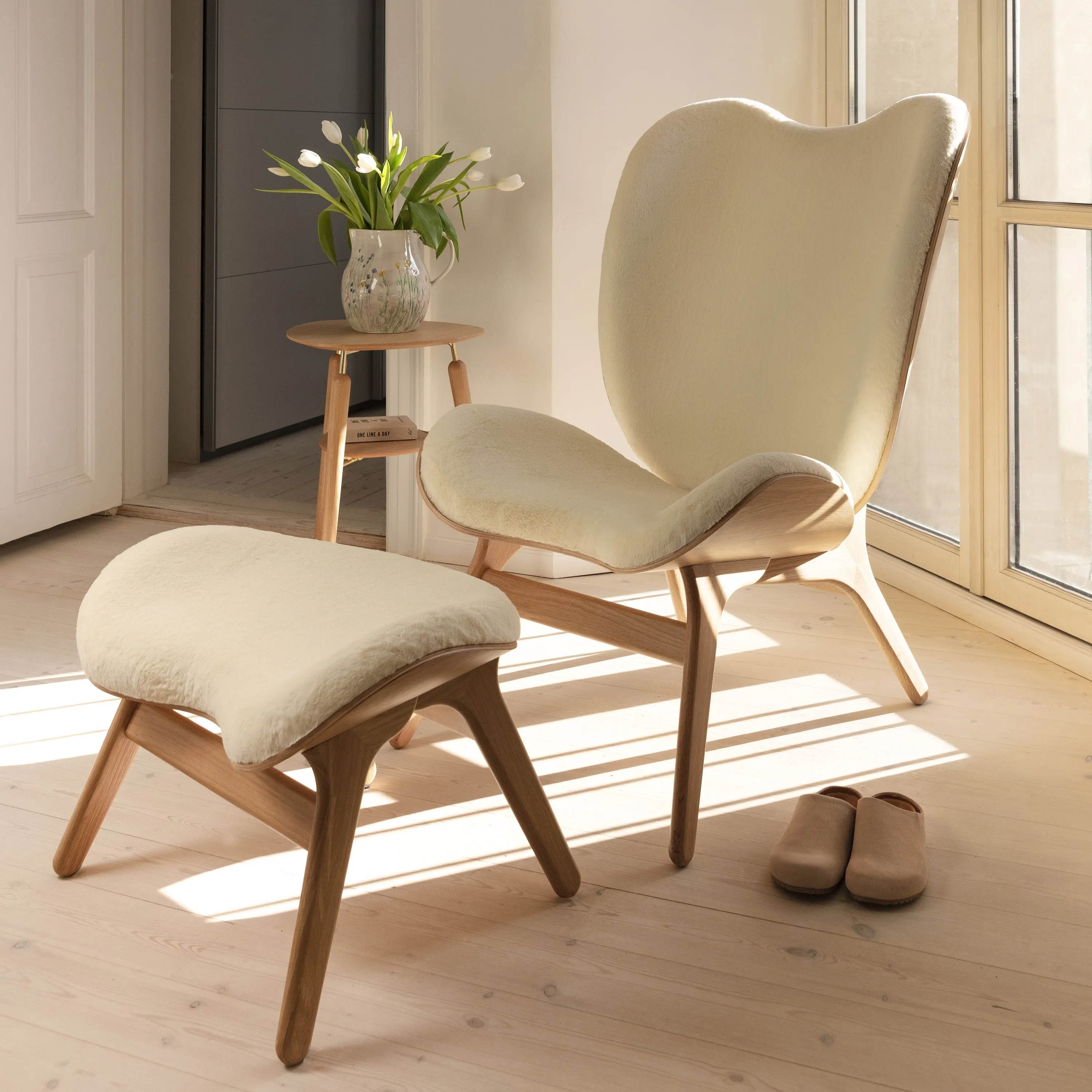 A Conversation Piece Tall Lounge Chair