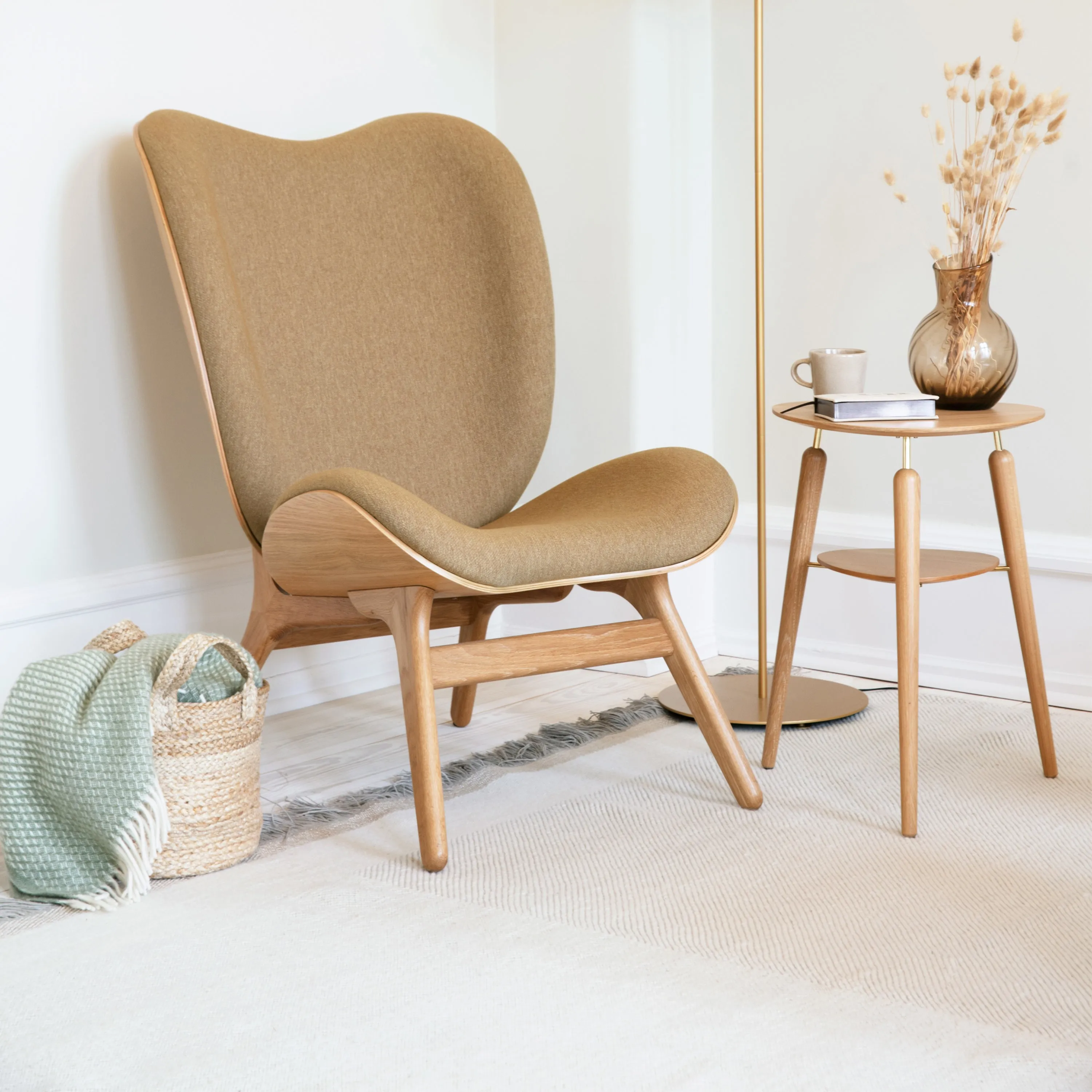 A Conversation Piece Tall Lounge Chair